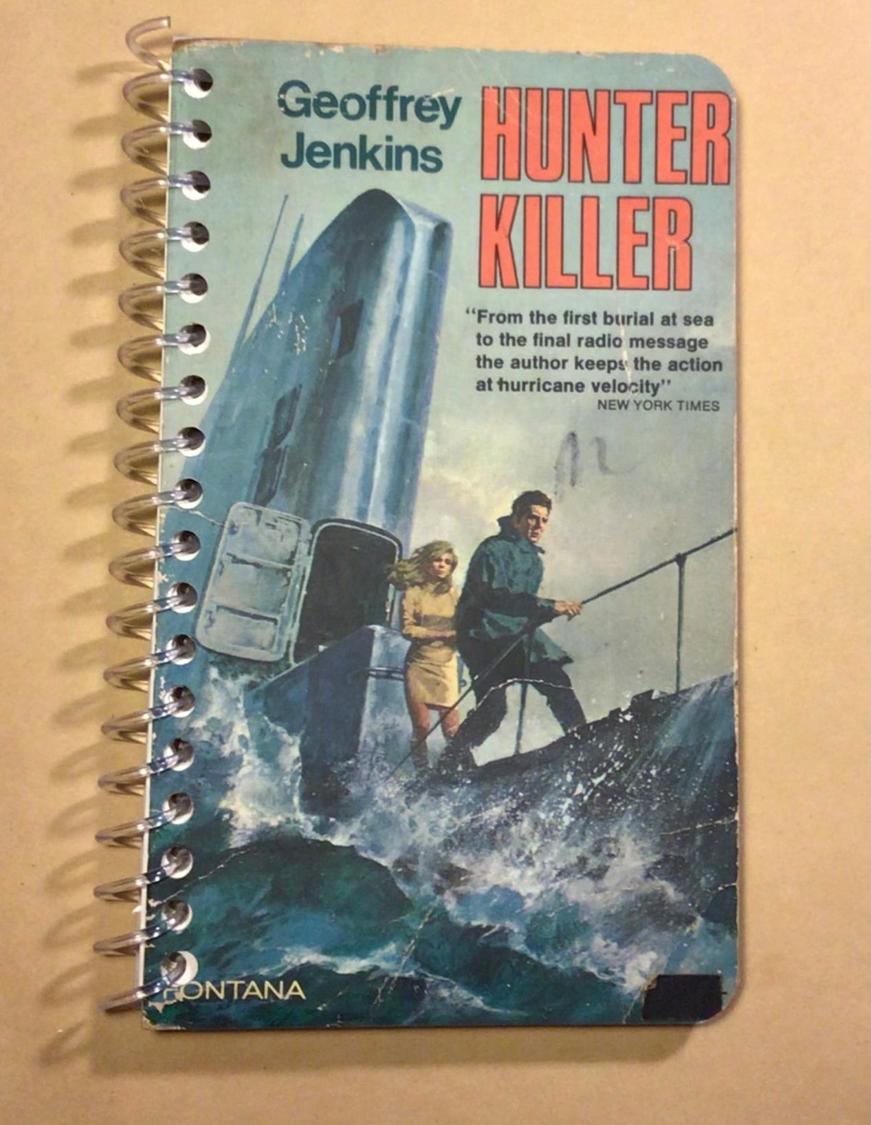 Paperback cover slimline notebook.